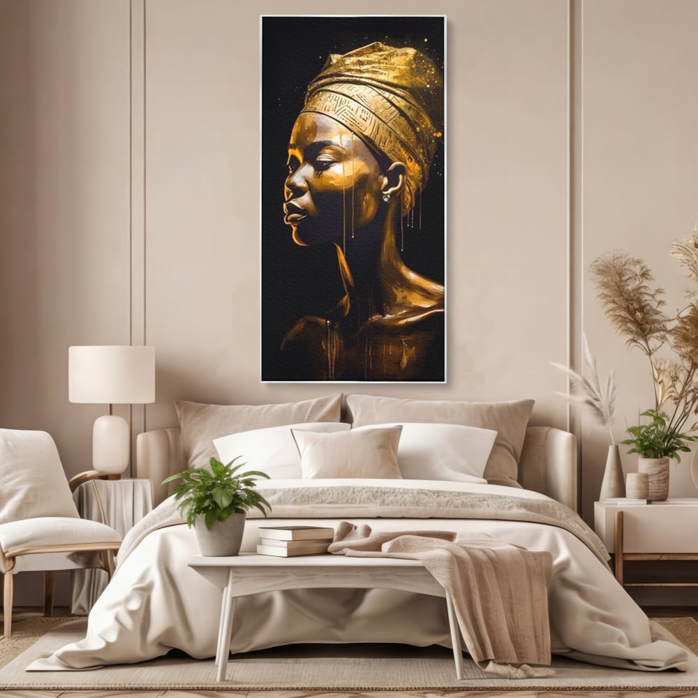 Tablou canvas cu tablou canvas cu femeie africana si turban auriu, in rama de aluminiu argintiu, pe perete intr-un dormitor